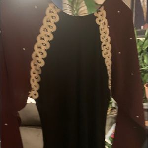 Burgundy and white collar dress.